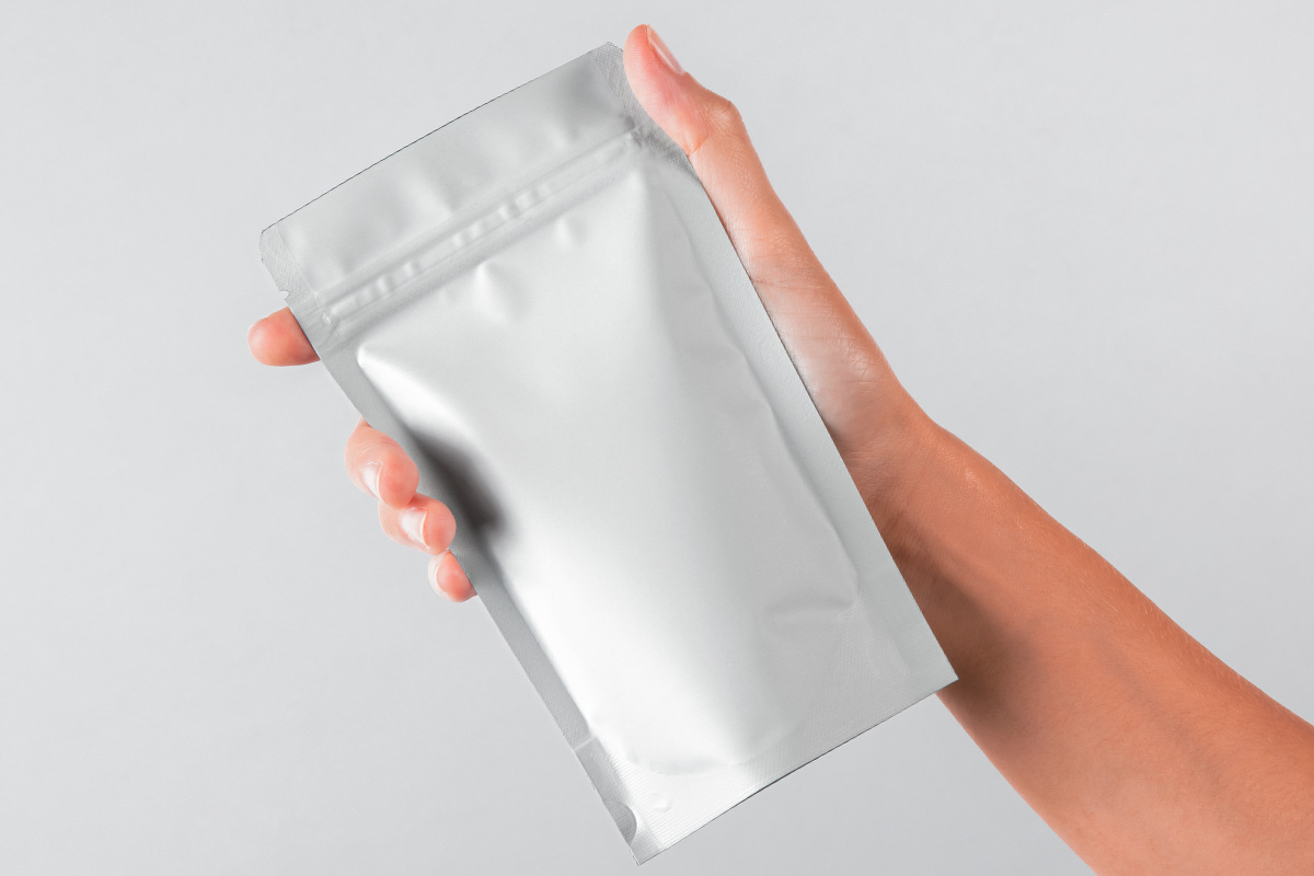 Hand Holding Psd Pouch Packaging Mockup | Psd Mock Up Templates | Pixeden