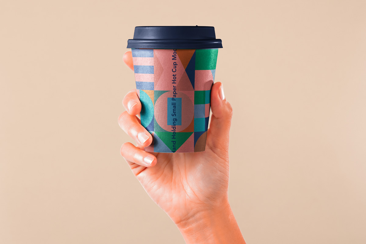 https://www.pixeden.com/media/k2/galleries/1979/001-hand-holding-paper-hot-cup-coffee-expresso-drink-packaging-branding-graphic-design-psd-mockup-pixeden.jpg